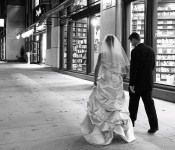 Wedding couple strolling down street by The Inn at Penn