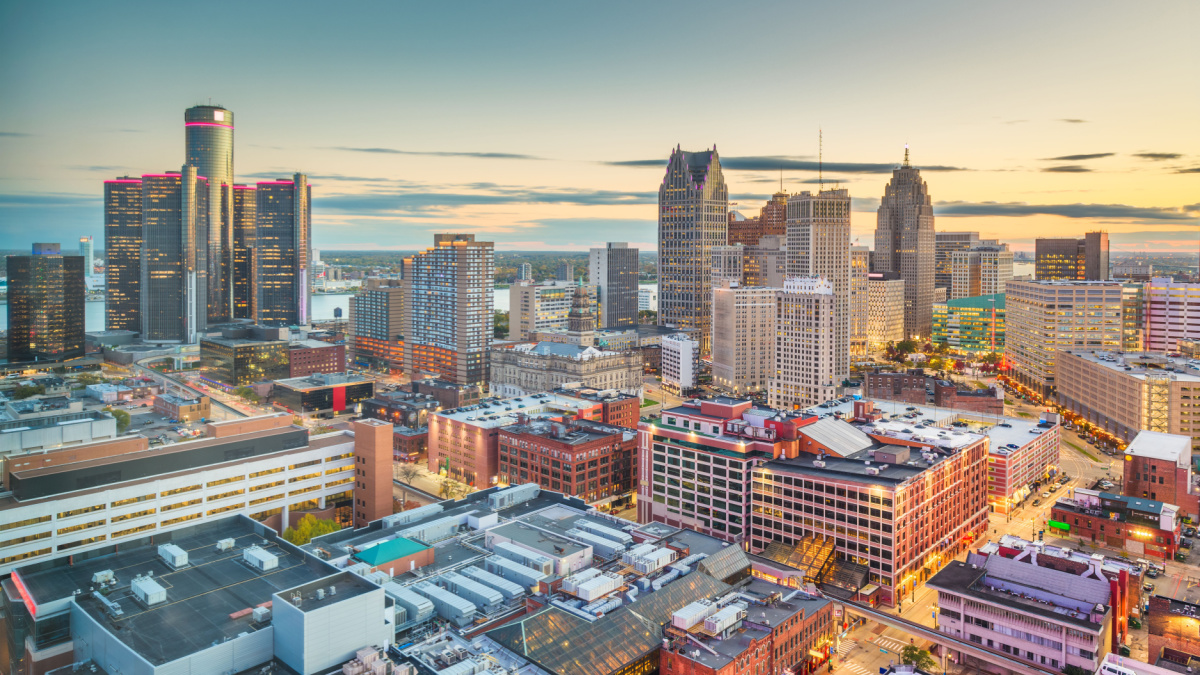 Detroit, Michigan, USA downtown skyline from above at dusk.