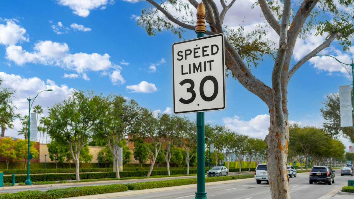 Anaheim, CA, USA – November 2, 2022: A 30 Speed Limit street sign posted on Katella Avenue in the Anaheim Resort District in Anaheim, California.