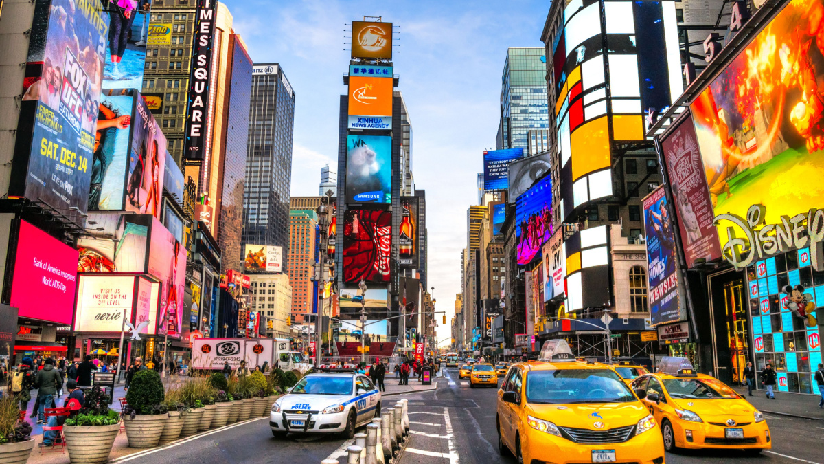 NEW YORK CITY - DEC 01 Times Square ,is a busy tourist intersection of neon art and commerce and is an iconic street of New York City and America, December 01th, 2013 in Manhattan, New York City.