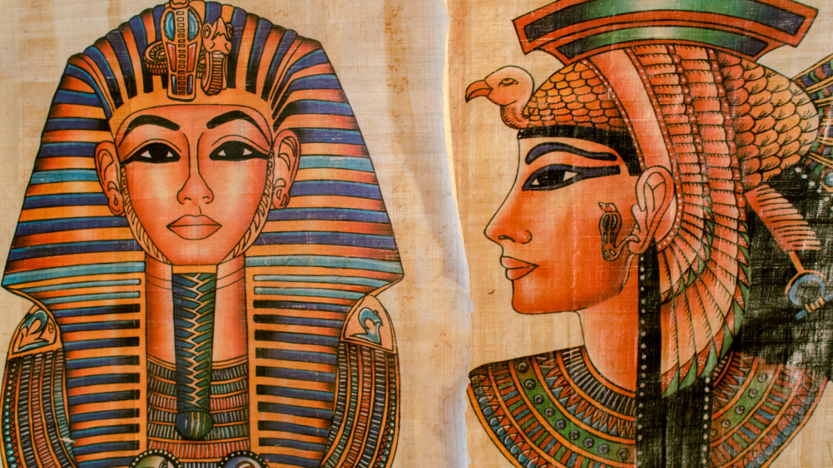 Old Paper With Egyptian Queen Cleopatra and sphinx.