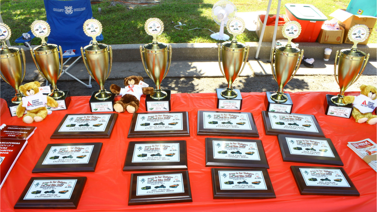 GLOUCESTER, VIRGINIA - AUGUST 22, 2015:The car show participants trophies and plaques in the DRIVE-IN FOR DIABETES CAR SHOW Sponsored by Tractor Supply in August in Gloucester Virginia.