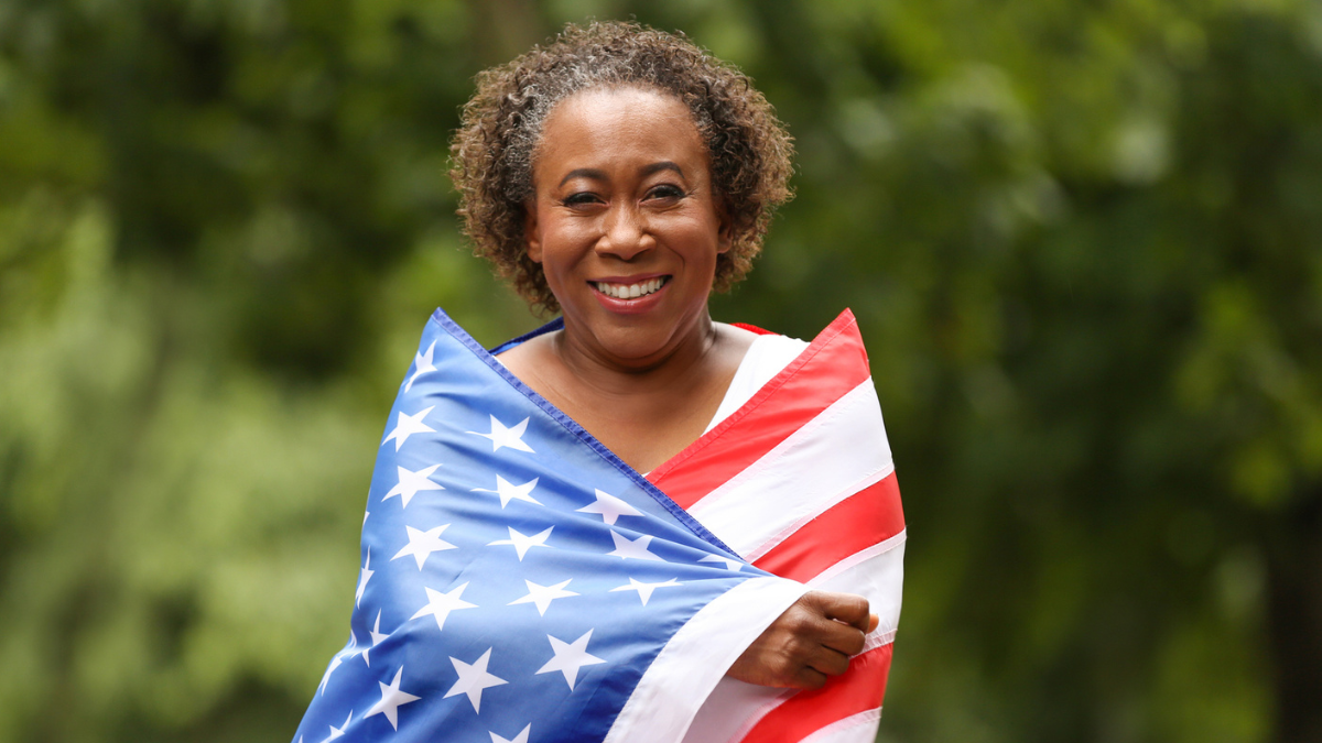 woman wrapped in a American flag.