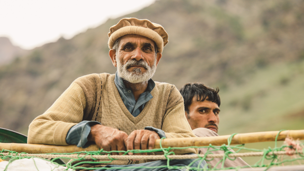 Gilgit, Pakistan - June 09, 2018: Old Pakistani Man with White Beard in Traditional Pakol.
