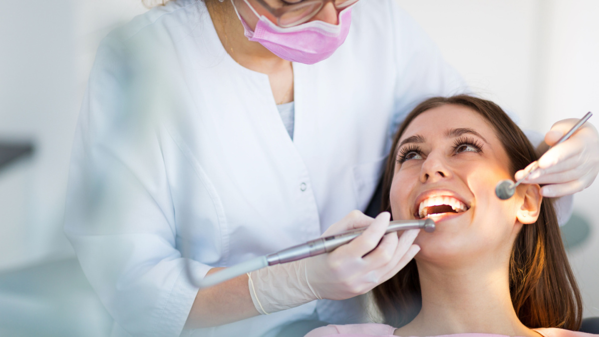 Dentist and patient in dentist office