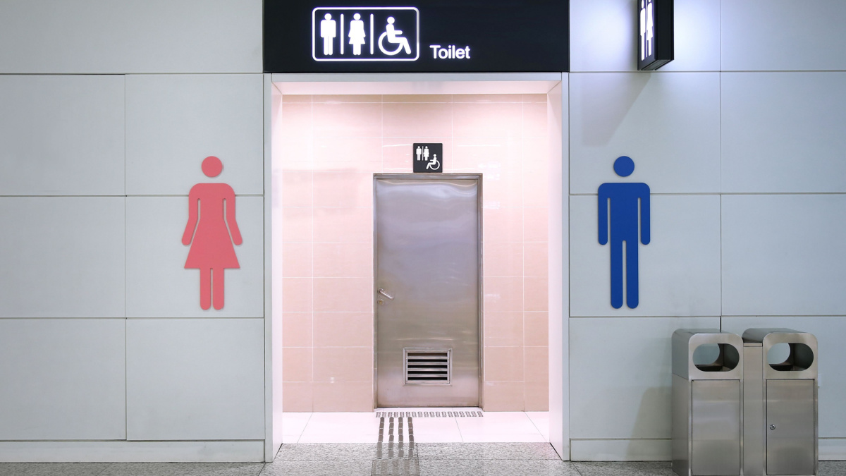 Public toilet entrance in modern airport building