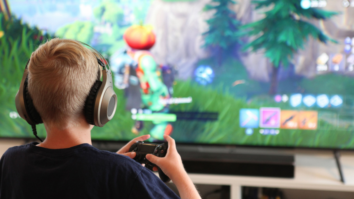 Boy playing Fortnite.