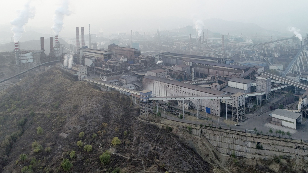 Aerial view of big factory in China.Air pollution by smoke coming out of chimneys. Coal Fossil Fuel Power Plant Smokestacks Emit Carbon Dioxide Pollution. Chengde, China.