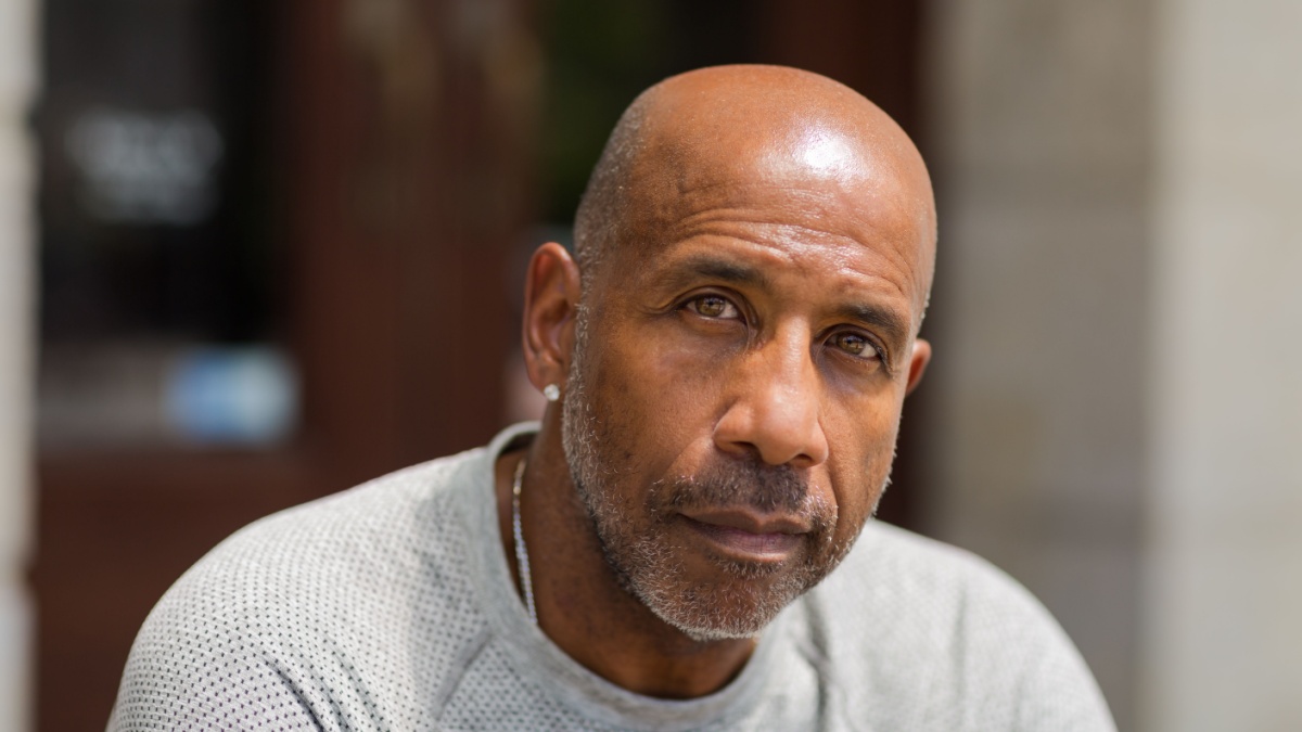 Mature African American man with a concerned look.