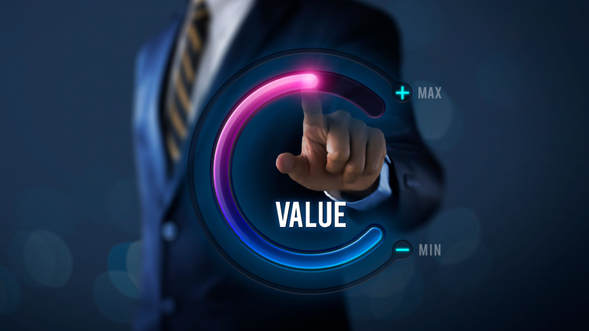 Growth value, increase value, value added or business growth concept. Businessman is pulling up circle progress bar with the word VALUE on dark tone background.