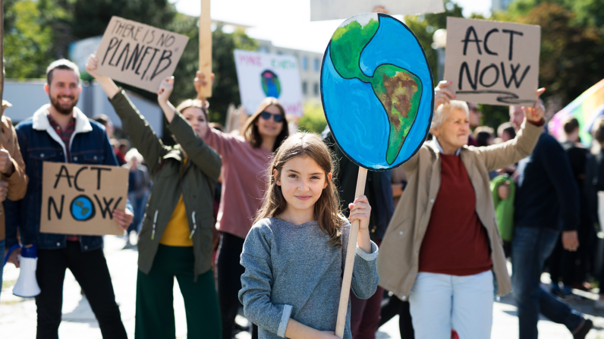 People with placards and posters on global strike for climate change.