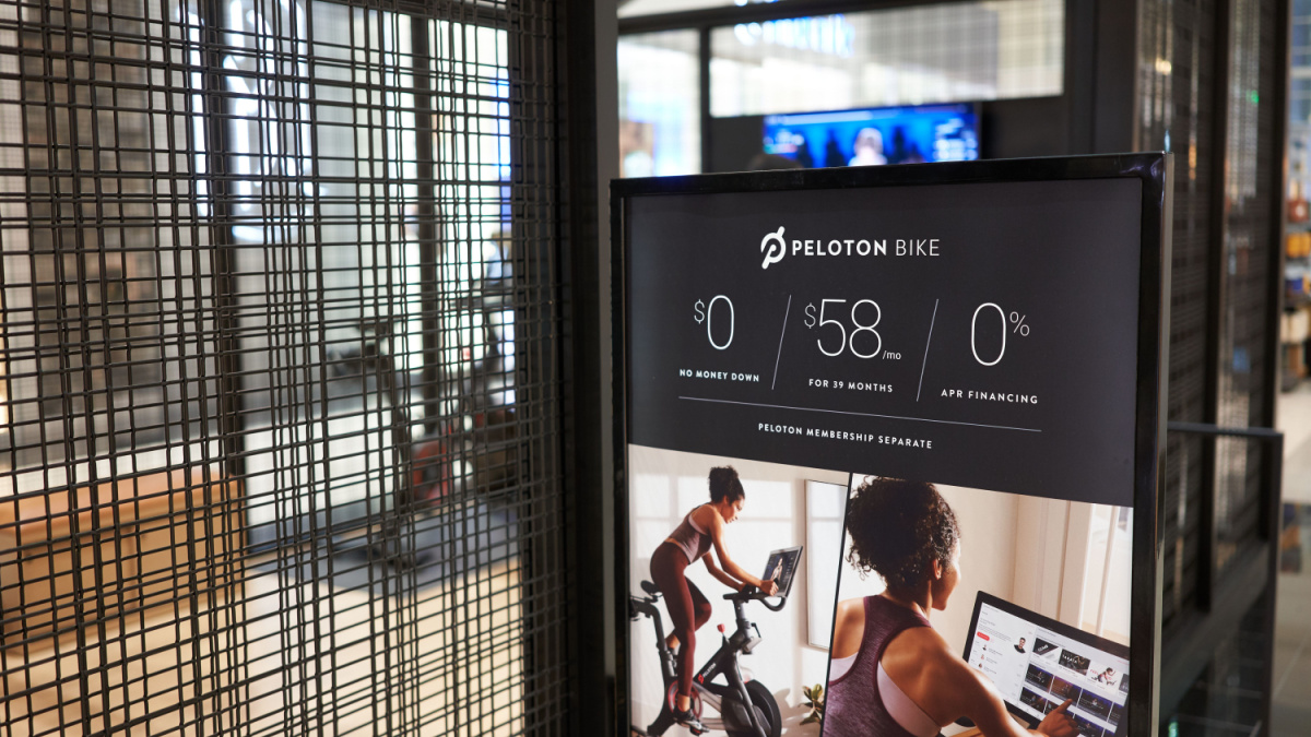 Peloton bike monthly payment plan advertisement is seen outside a Peloton showroom in Washington Square Shopping Center in Tigard.