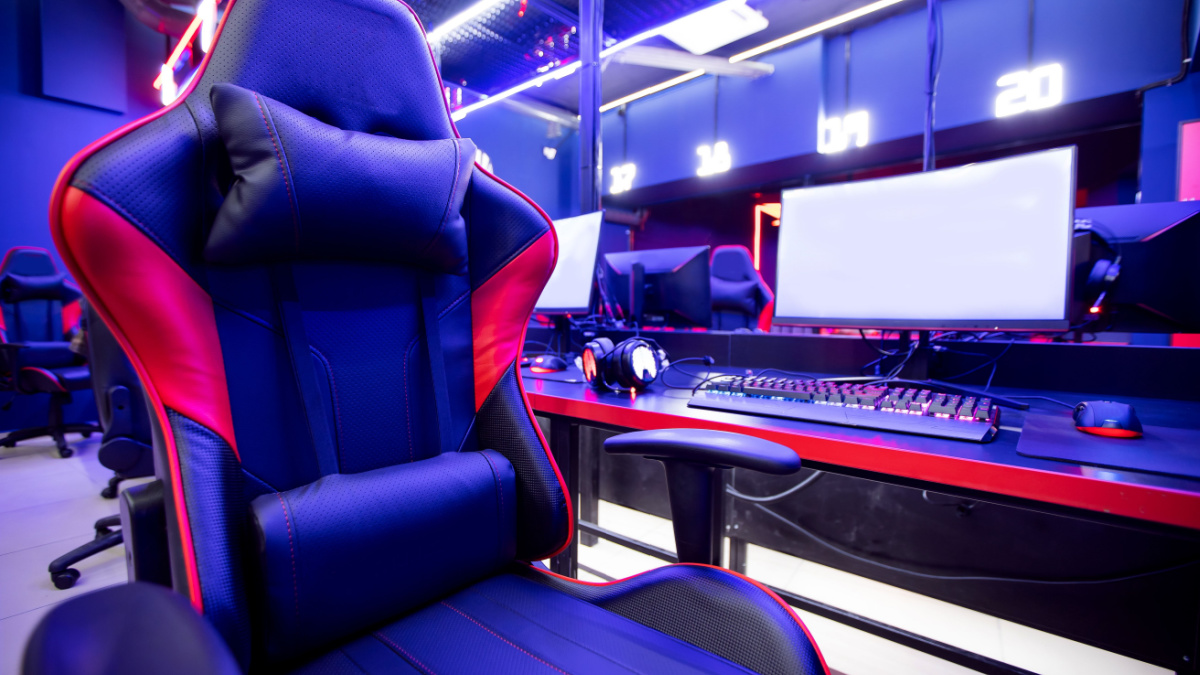 Professional gamers cafe room with powerful personal computer game chair blue color. Concept cyber sport arena.
