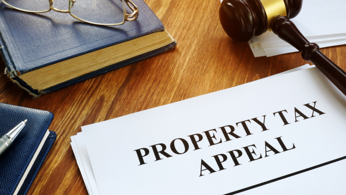 Property Tax Appeal documents and wooden gavel.