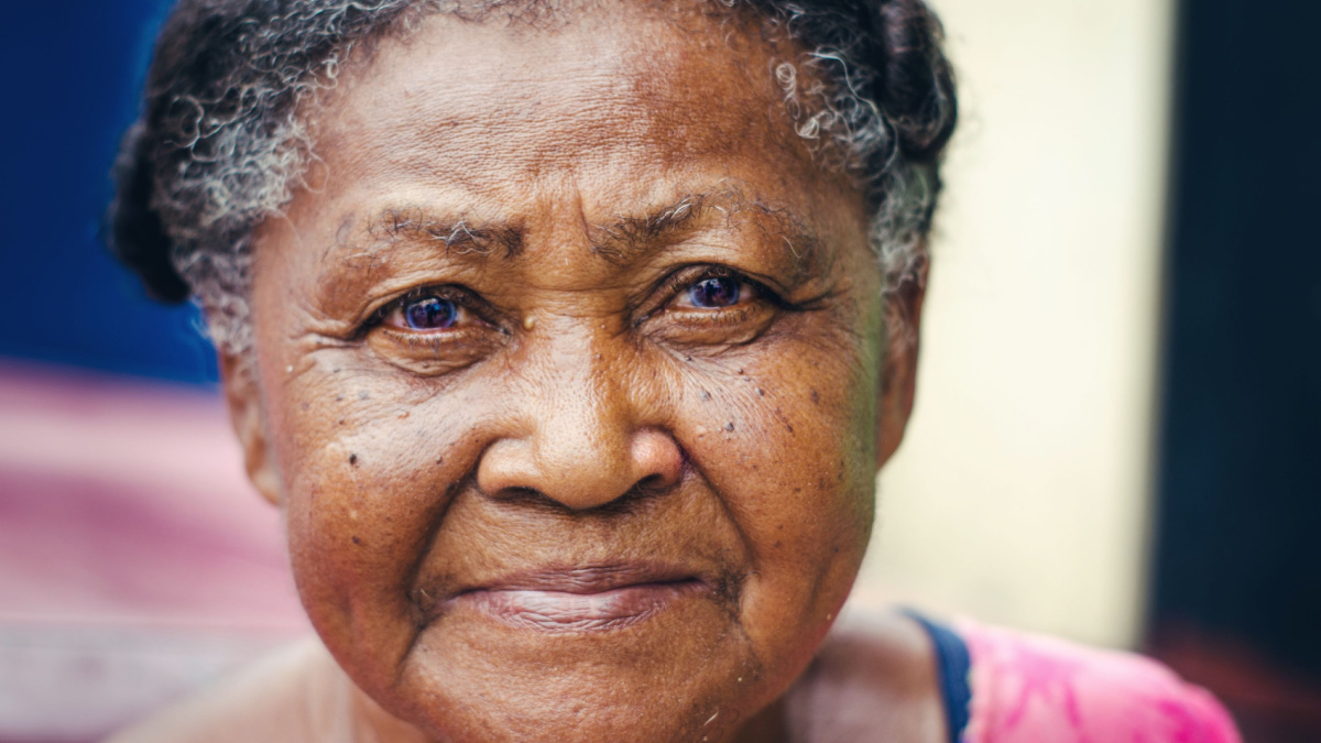 portrait of an elderly woman with beautiful look of Dominican Latin origin looking at the camera.