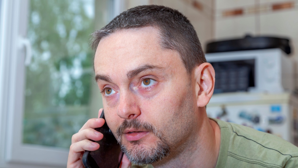 handsome business man working from home during the coronavirus outbreak.