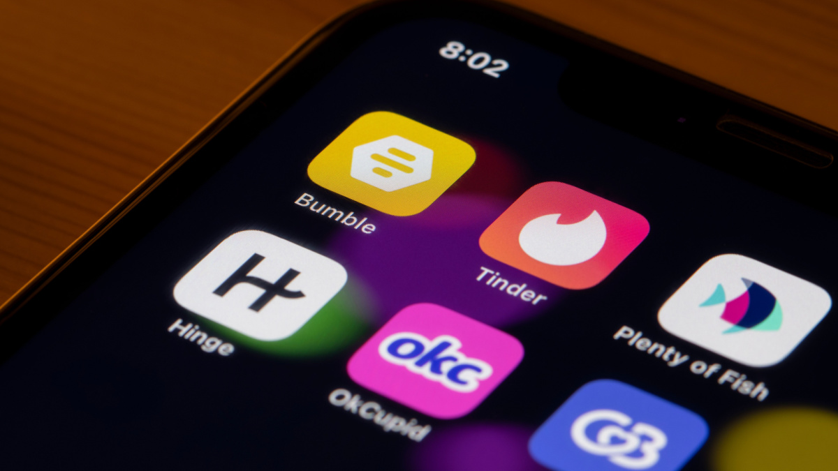 Assorted dating apps are seen on an iPhone - Bumble, Tinder, Plenty of Fish, Hinge, OKCupid (OKC), and Coffee Meets Bagel (CMB).