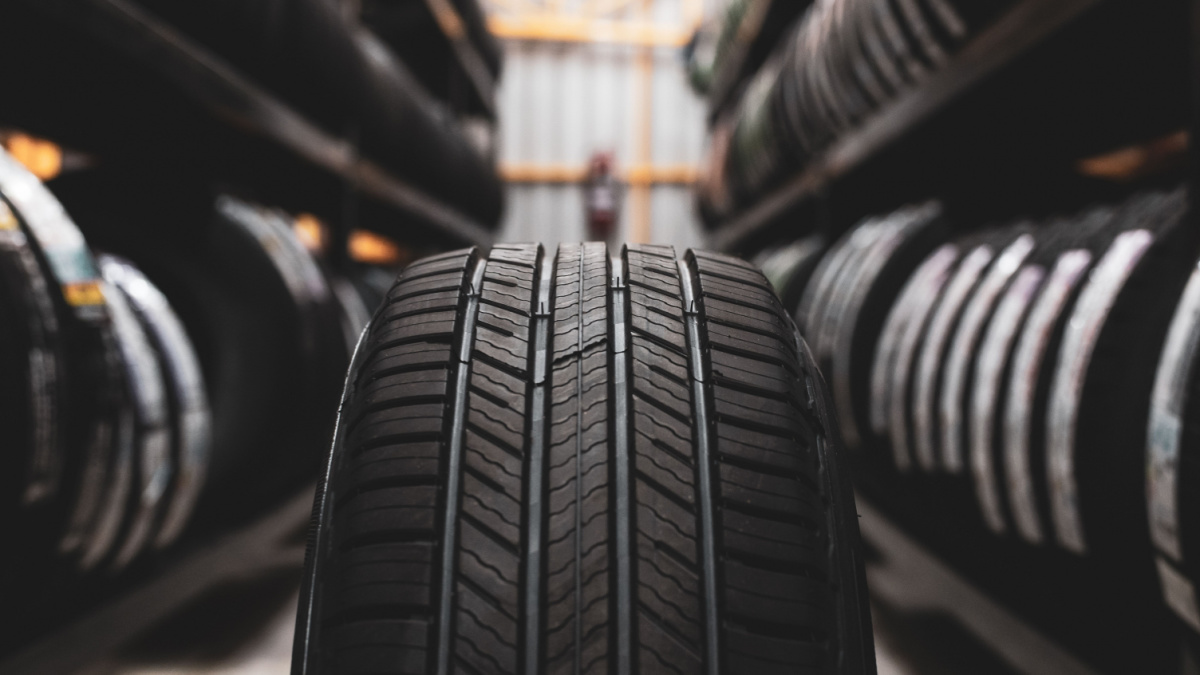 A new tire is placed on the tire storage rack in the car workshop. Be prepared for vehicles that need to change tires.