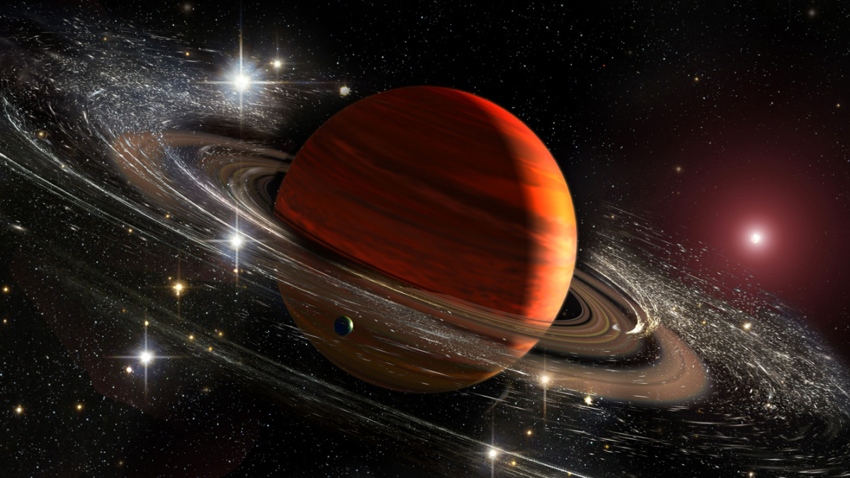 Saturn planet with rings in outer space among star dust and srars. Titan moon seen. Elements of this image furnished by NASA.