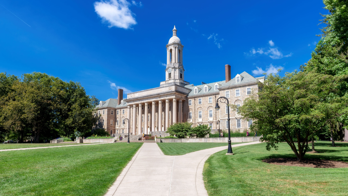 The Old Main building on the campus of Penn State University in sunny day on September 1, 2022 in State College, Pennsylvania.