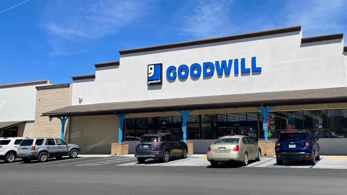 The Goodwill store from the parking lot on a sunny day under blue sky