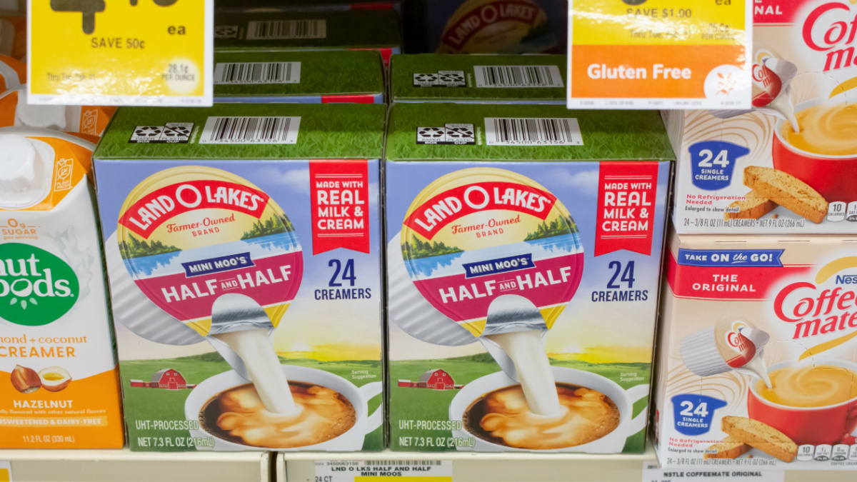 A view of several packages of Land O Lakes Mini Moo's Half and Half, on display at a local grocery store.
