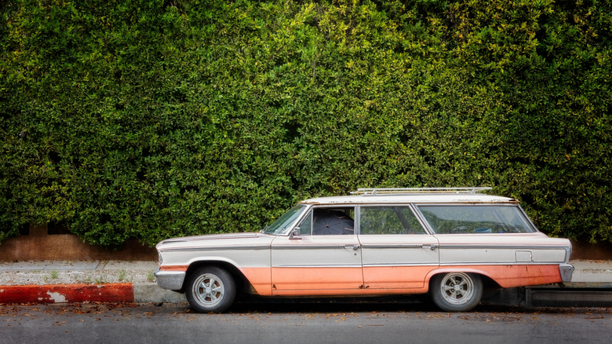 A mid sixties station wagon sits on the street in Hollywood, California.