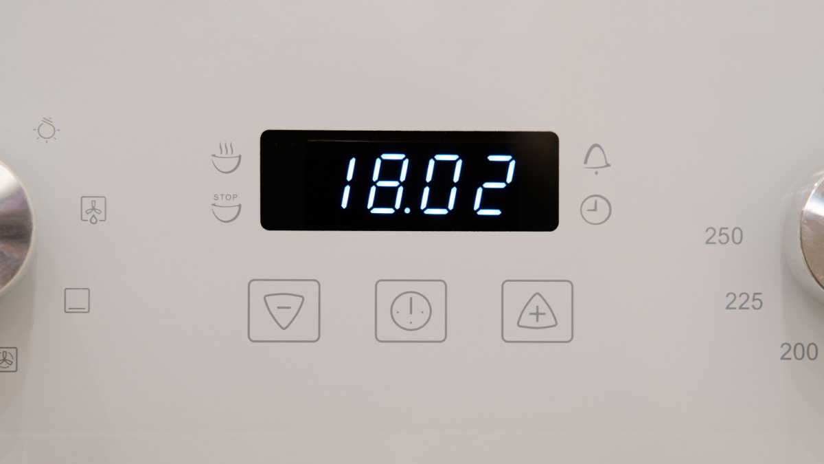 Timer clock on the kitchen oven. Cooking time, close-up.