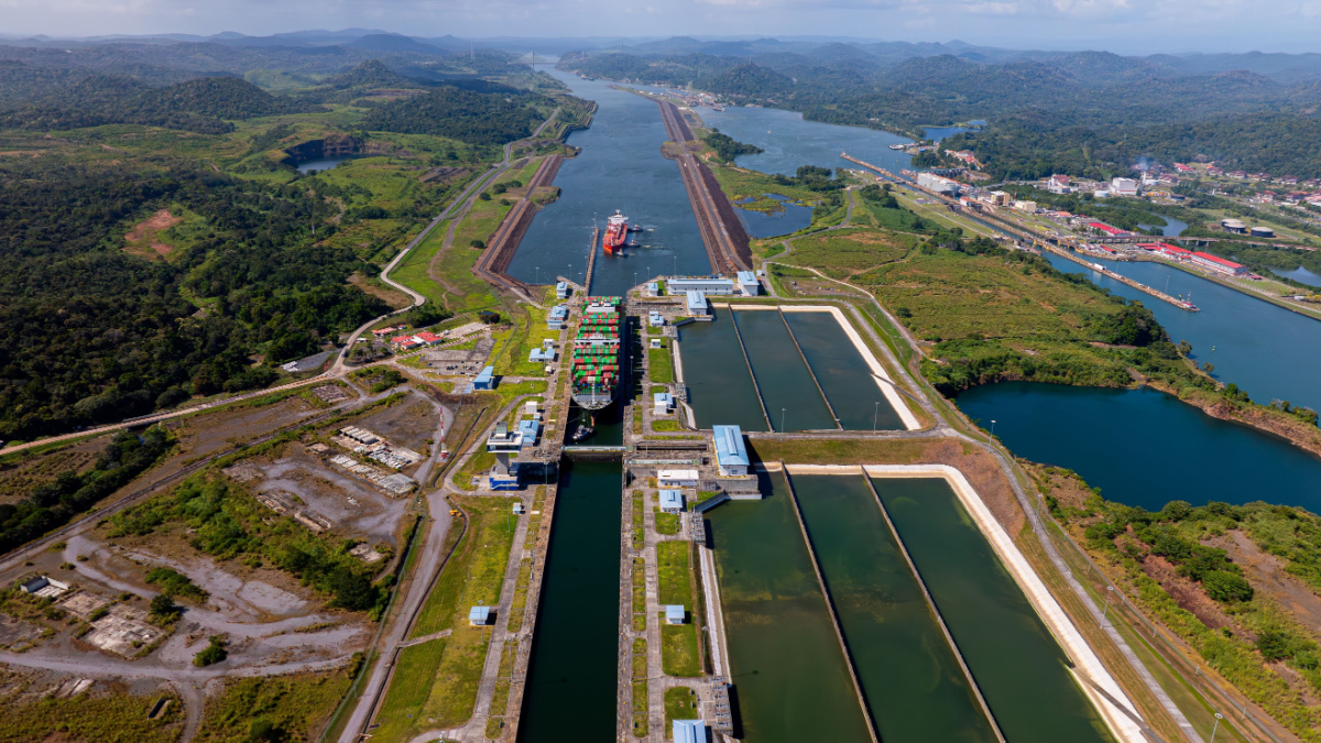 Aerial view Panama Canal, third set of locks, water shortages, maritime traffic, water reuse vats, summer drought.