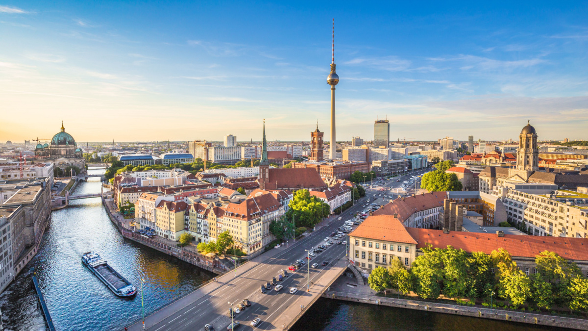 Aerial view of Berlin skyline and Spree river in beautiful evening light at sunset in summer, Germany