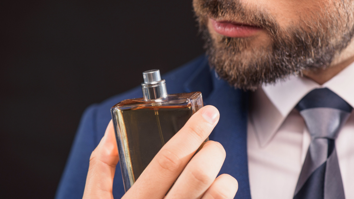 Successful businessman likes cologne scent