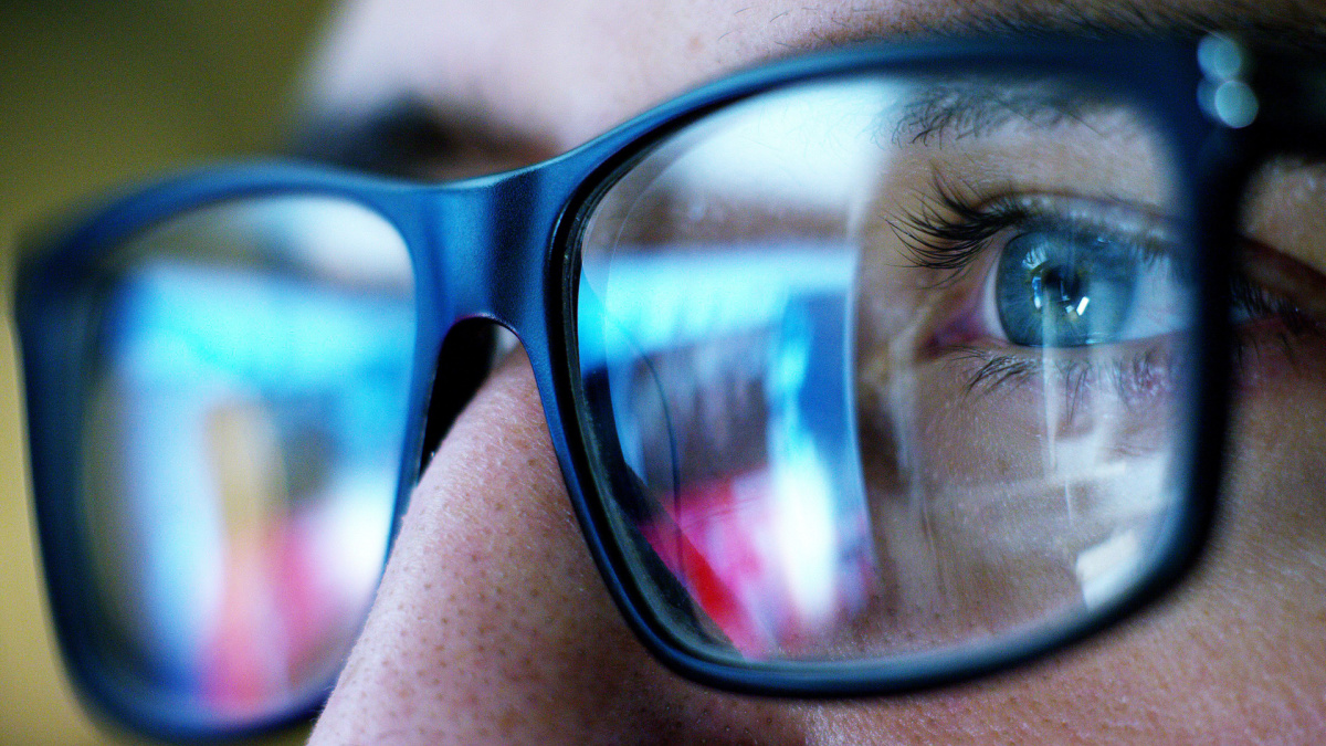 macro eyes web surfer and the office worker, insurance broker, workaholic, while working in the office evenings, control and security in the accesses, security, concept of internet web application.