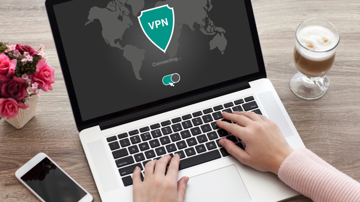 woman holding notebook with app vpn creation Internet protocols for protection private network