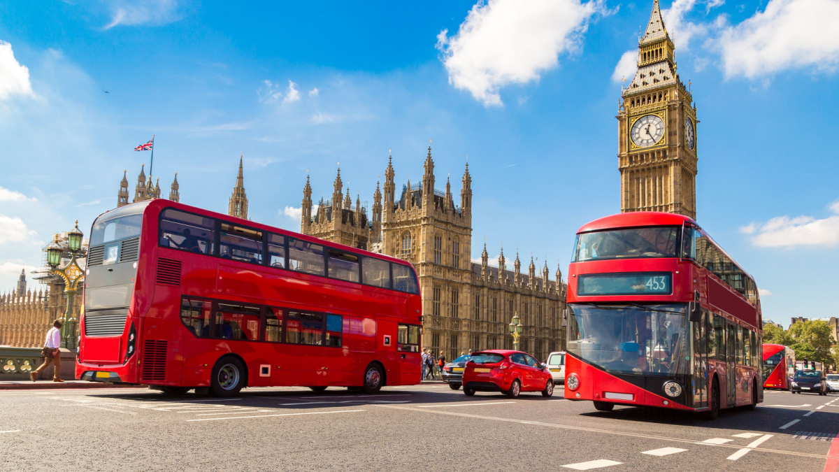 Big Ben, Westminster Bridge and red double decker bus in London, England, United Kingdom