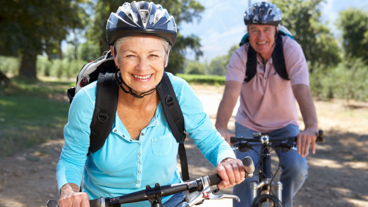 Senior couple on country bike ride.