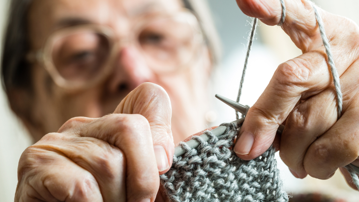 Hands of woman knitting.