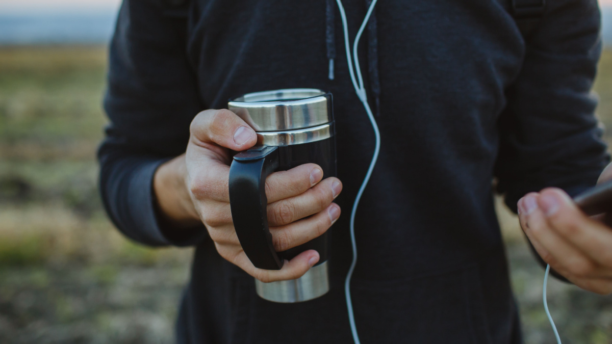 Thermos with warm black coffee.