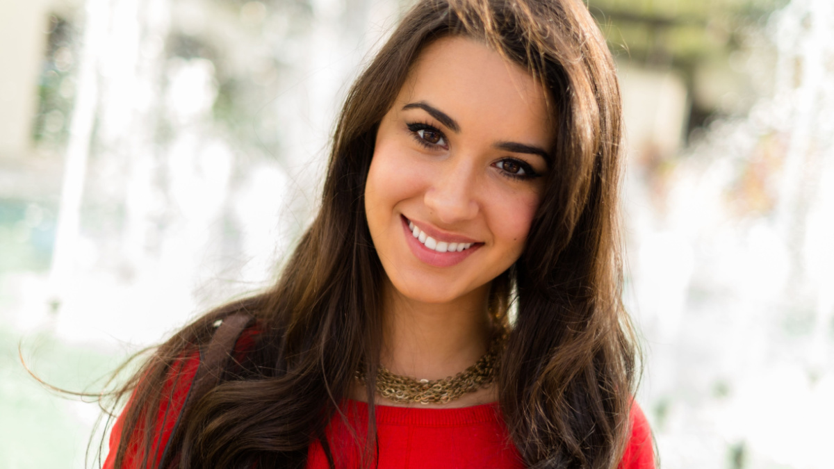 Beautiful young multicultural woman outdoor portrait.