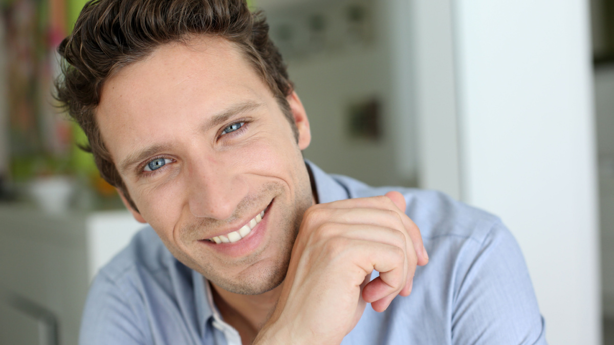 Portrait of handsome guy with blue shirt.