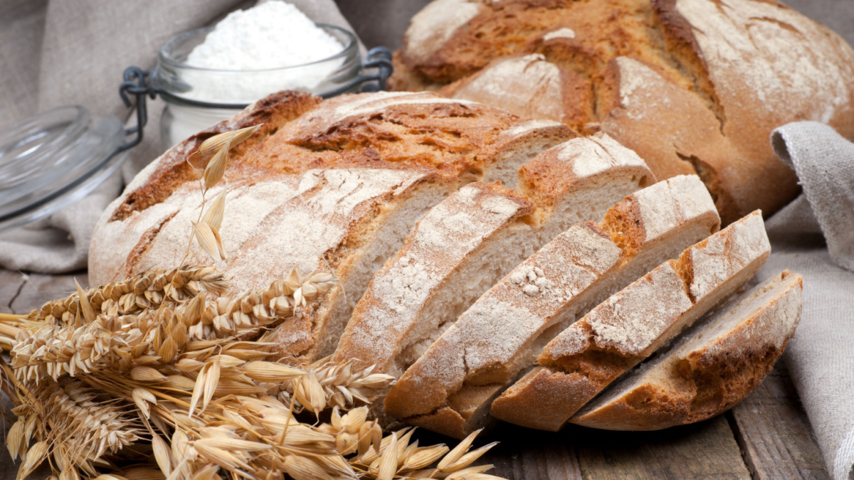 10 Things To Stop Buying and Start Making Yourself 3 Fresh bread on wooden ground