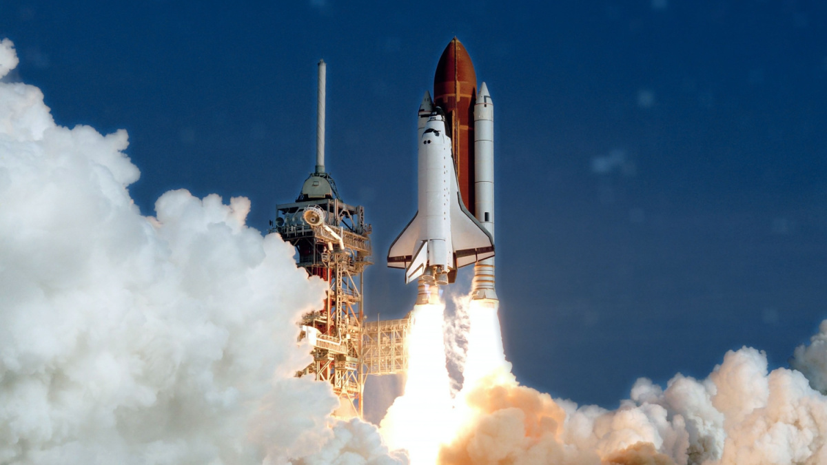 The launch of the space shuttle. With fire and smoke. Against the background of the starry sky. Elements of this image were furnished by NASA