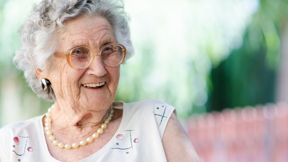 Portrait of a smiling elderly woman.