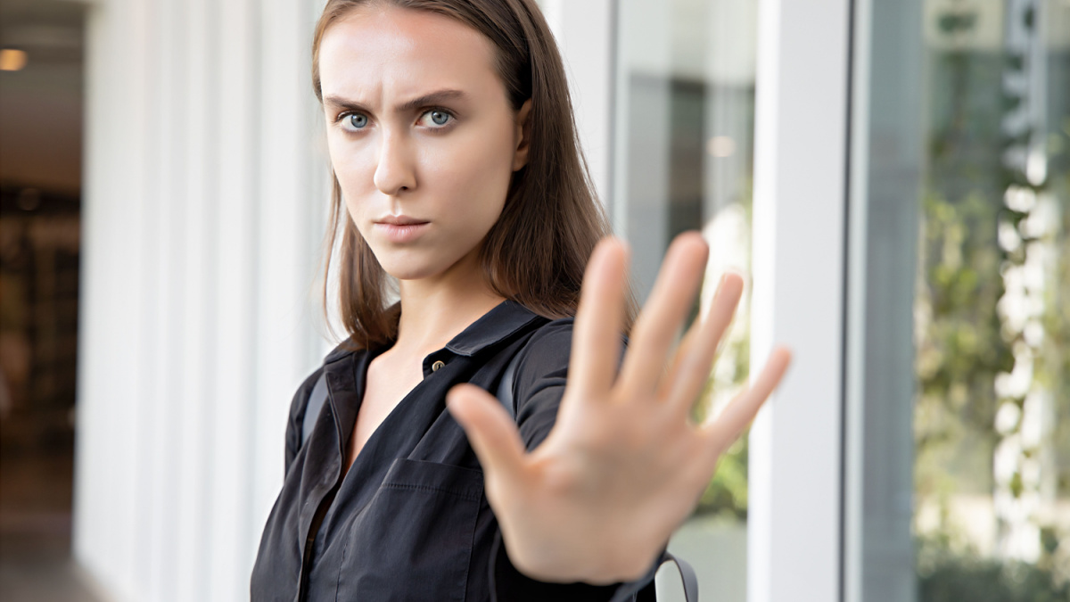 10 Things To Stop Buying and Start Making Yourself 12 woman saying no or stop with hand gesture; caucasian white woman puts her hand up for stop, halt, no way, rejection, turning down, disapproval, broken deal; Russian caucasian young adult woman model