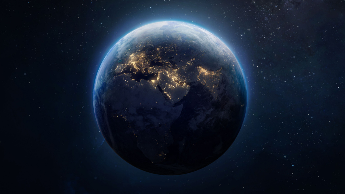 Sphere of nightly Earth planet in outer space. City lights on planet. Life of people. Solar system element. Elements of this image furnished by NASA