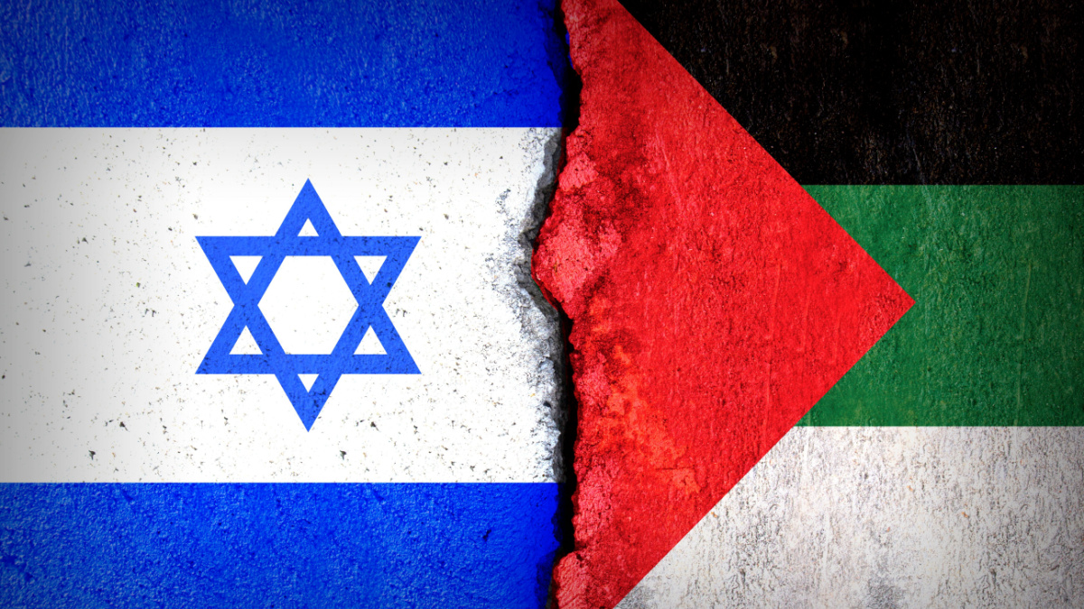 Flags of Israel and Palestine painted on cracked wall background. Concept of the Conflict between Israel and the Palestinian Authorities.