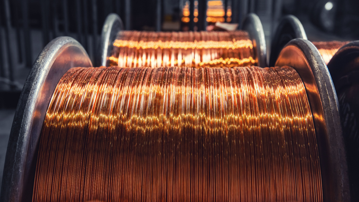 Copper wire cable production in coils, metal steel industrial plant.