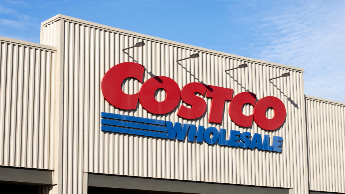 Hillsboro, OR, USA - Nov 17, 2021: Closeup of the Costco sign seen at the entrance to its store in Hillsboro, Oregon. Costco Wholesale Corporation is an American multinational retail corporation.