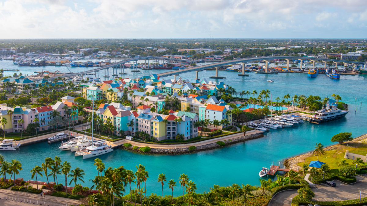 Harborside Villas aerial view at Nassau Harbour with Nassau downtown at the background, from Paradise Island, Bahamas.