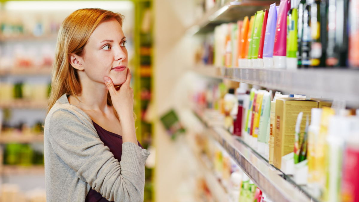 Young Woman Shopping for personal items, shampoo, lotions, face wash, body wash