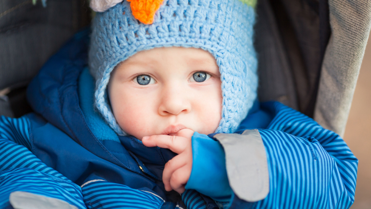 Cute little baby in a stroller outdoor